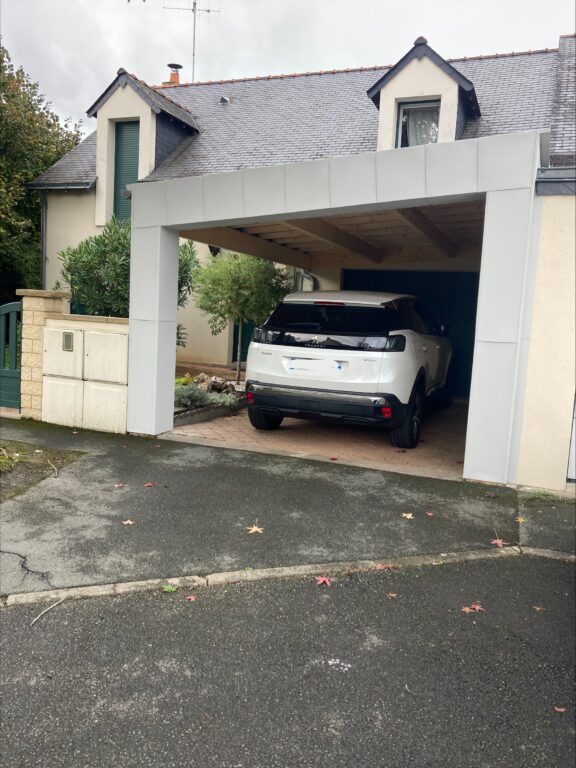 installation abri voiture 49